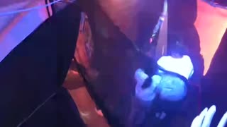 A visitor reacting inside the Halloween tent